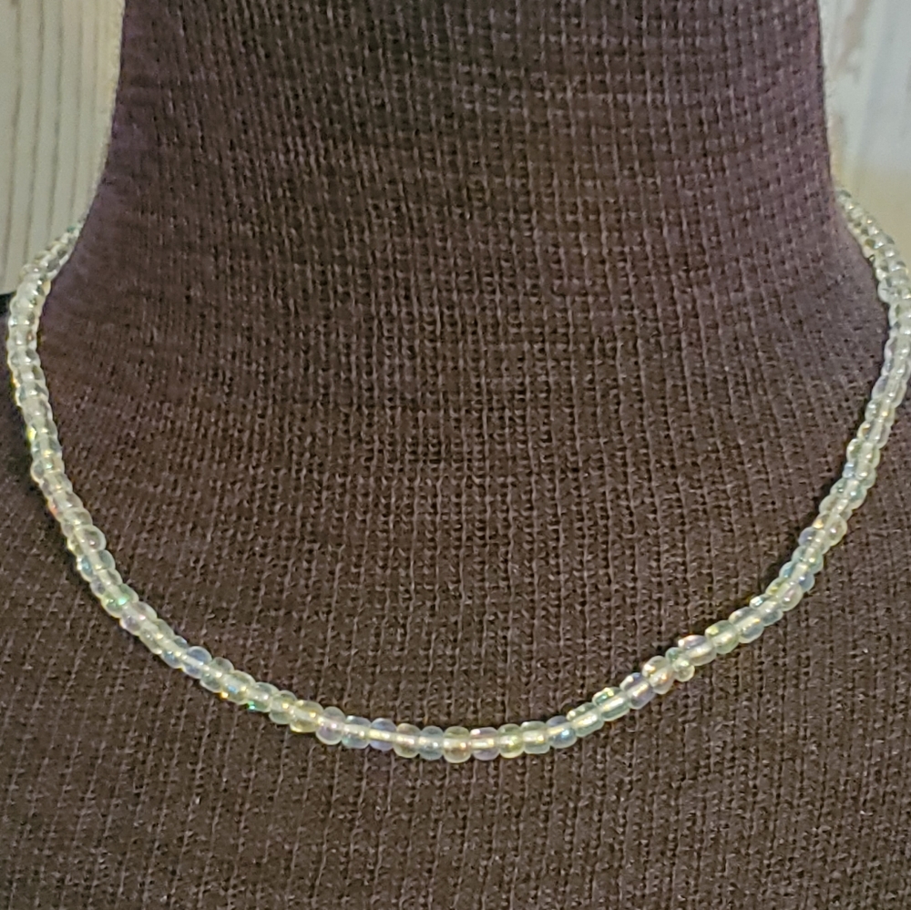 Clear iridescent beaded stretch necklace 14 inches long unstretched